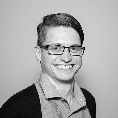 Headshot of James White smiling like an absolute idiot!